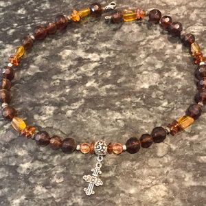 Beaded necklace with cross